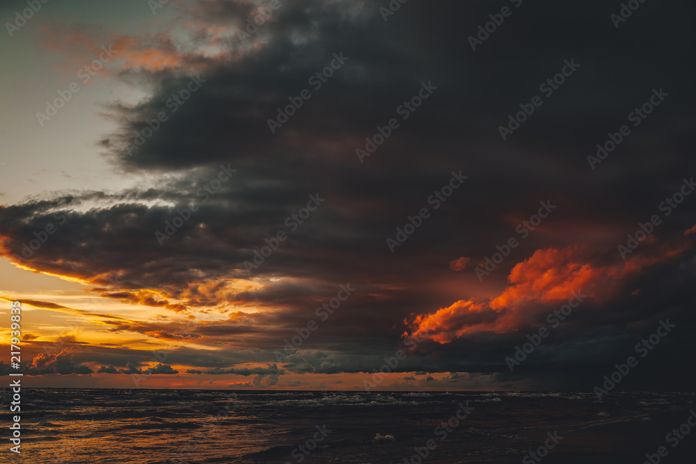Evening by the sea, dramatic clouds, sky before storm in baltic sea