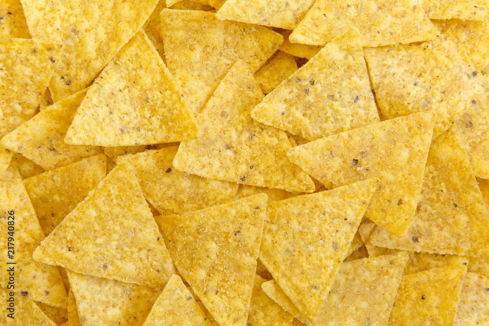 Tortilla chips, close-up. Mexican food. Top view, flat lay, overhead. Tortilla chips, close-up. Mexican food. Top view, flat lay, overhead.