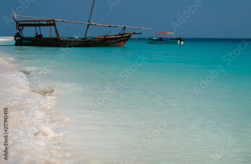 A wooden pirate ship by the shore. The coast of the Indian Ocean. Zanzibar of Tanzania © stockmaliavanne
