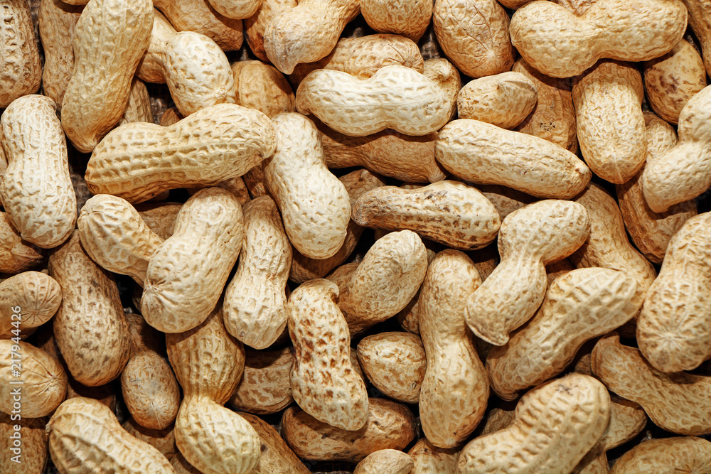 Peanuts in shells on the background of sack cloth. Peanuts in shells on the background of sack cloth.