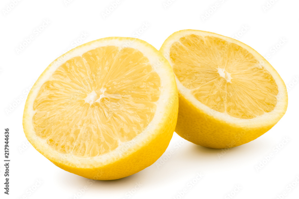 Two halves of lemon on a white. Isolated. Two halves of lemon on a white. Isolated.