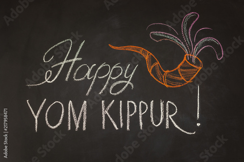 Obraz na płótnie Inscription Happy Yom Kippur and symbol Rosh Hashanah on chalkboard background