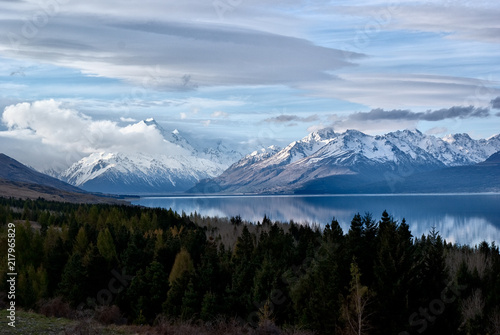 Snowy mountainous landscape of the New Zealand alps with dramatic skies, during a motorhome trip. © Joaquin Corbalan