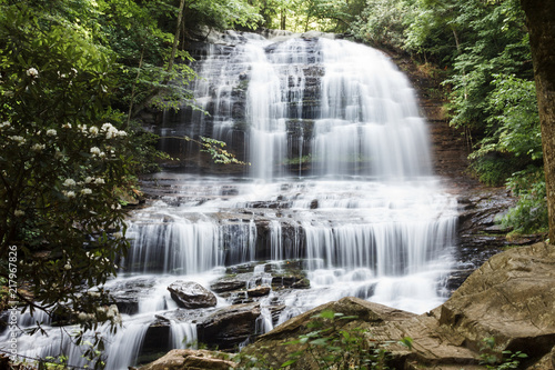 Beautiful high waterfall among the forest in summer. Waterfall and Botanical Preserve Pearson s Falls  Saluda  NC  USA