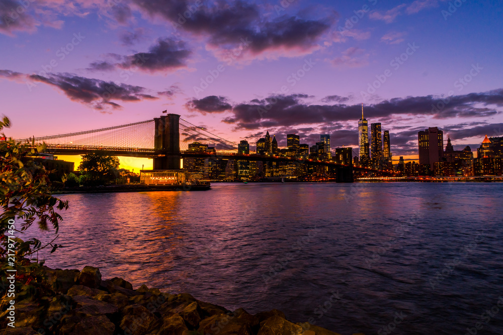 New York Skyline with Brooklyn Bridge Hudson River Manhatten Twi