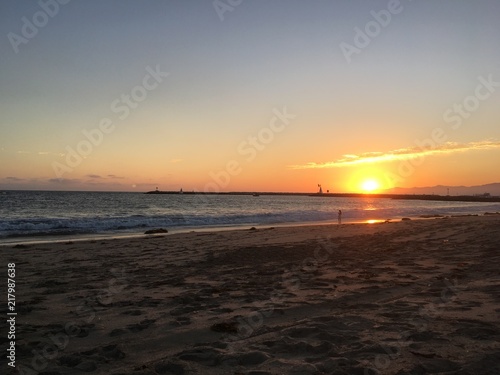 Sunset over the waves at Playa Del Rey Beach in Los Angeles California. © laurenelisabeth
