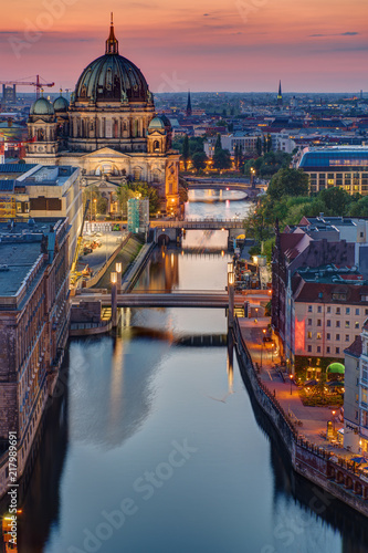 The Spree river in Berlin with the cathedral at sunset