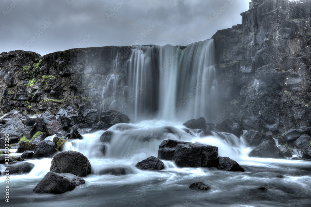 Öxarárfoss waterfall with long exposure - obrazy, fototapety, plakaty 
