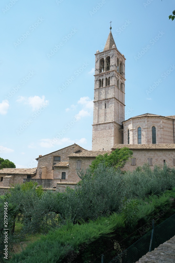 Assisi,Italy-July 28, 2018: View of Basilica di Santa Chiara or Basilica of St. Clare from Borgo Aretino street, Assisi 