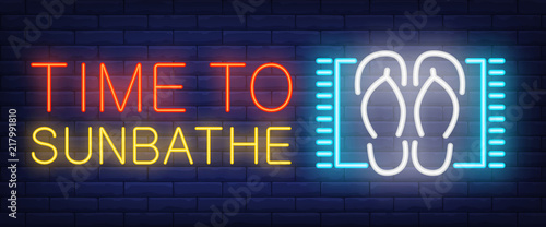 Time to sunbathe neon text with flip flops. Summer vacation and tourism concept. Advertisement design. Night bright neon sign, colorful billboard, light banner. Vector illustration in neon style.
