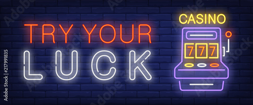 Try your luck neon text with slot machine. Gambling and casino concept. Advertisement design. Night bright neon sign, colorful billboard, light banner. Vector illustration in neon style.