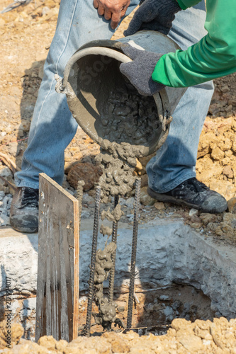 Pour concrete into foundation piles