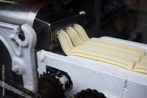 machine in the dough factory, for cooking churros