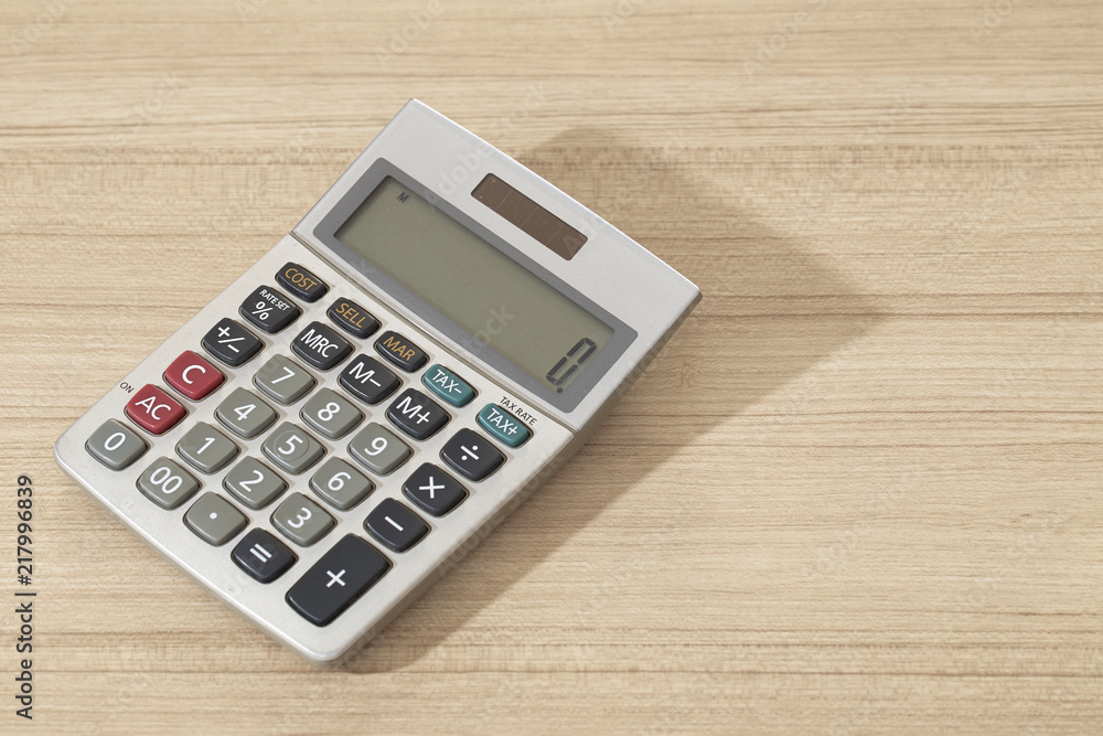 Close-up Of Calculator On Table Close-up Of Calculator On Table