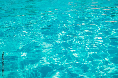 Water swimming pool. pool with blue water. Background of clean blue rippled water in a hotel swimming pool