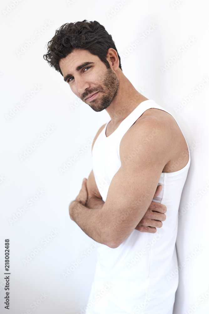 Confident guy in vest looking to camera Confident guy in vest looking to camera