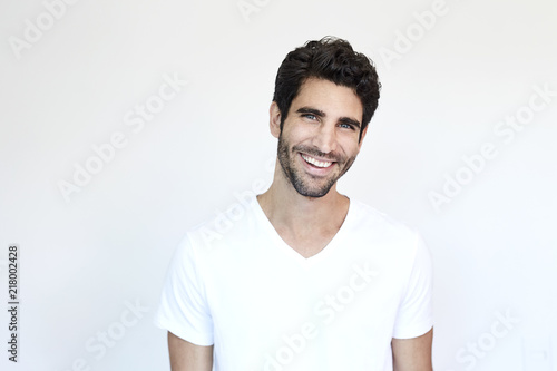 Smiling guy in white t-shirt, portrait