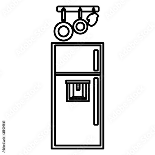 kitchen fridge with utensils hanging