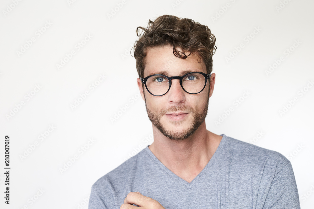 Portrait of handsome guy in glasses Stock Photo | Adobe Stock