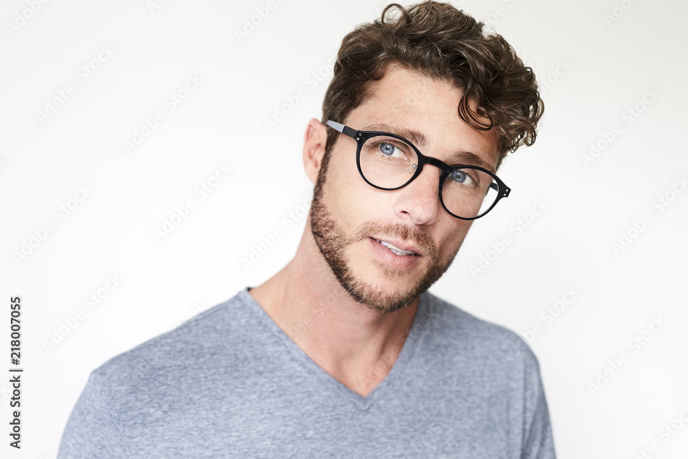 Handsome dude in grey looking at camera Handsome dude in grey looking at camera