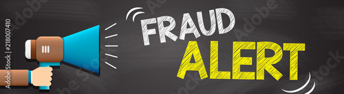 Hand holding megaphone with Fraud Alert text. Hand holding megaphone with open space for your text.