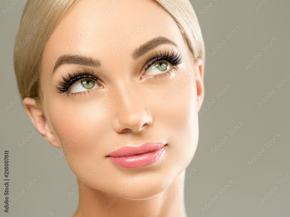 Lashes eyes blonde woman face closeup beauty healthy skin female