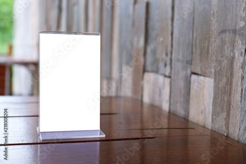 Wallpaper Mural Menu frame standing on wood table in Bar restaurant cafe. space for text marketing promotion. Torontodigital.ca