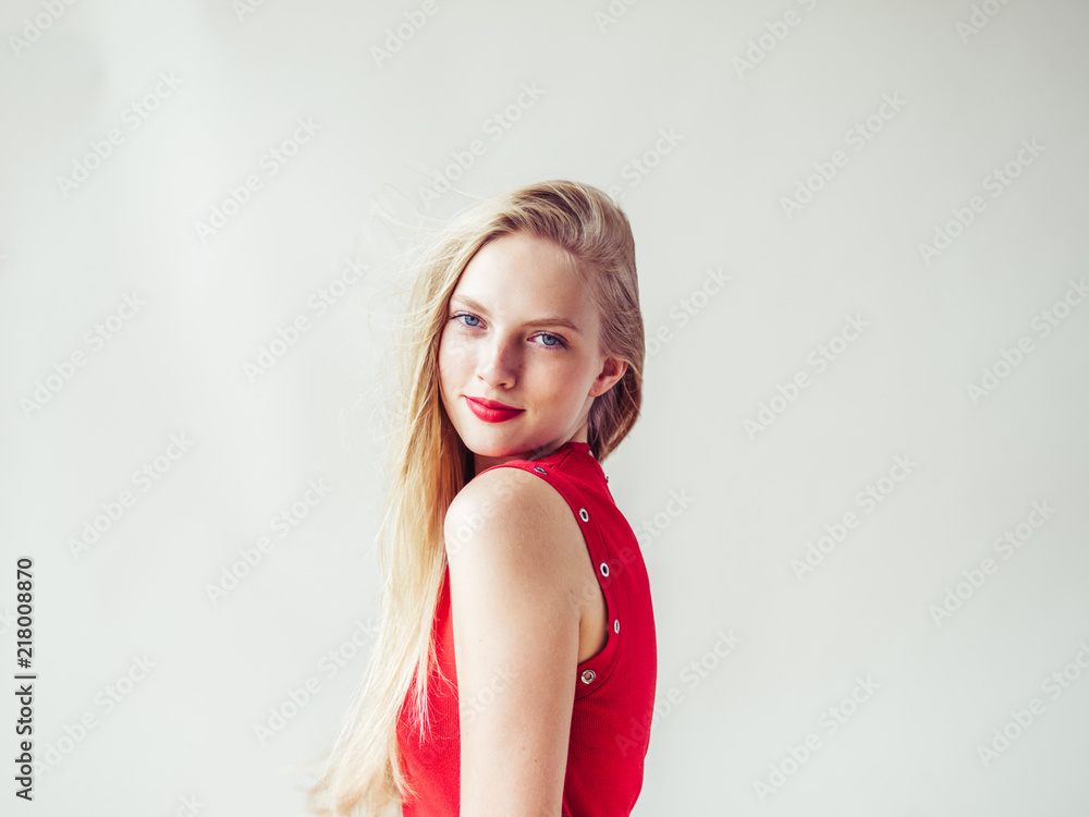 Beautiful blonde woman with long blonde hair and red lips Beautiful blonde woman with long blonde hair and red lips