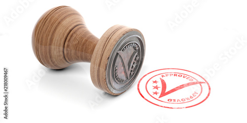 Obraz na płótnie Wooden round rubber stamper and stamp with text approved isolated on white background