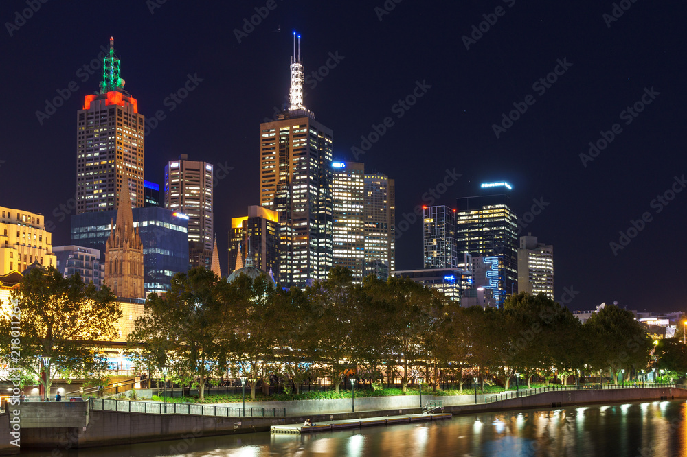 Skyline in front of river during night, central bussiness district
