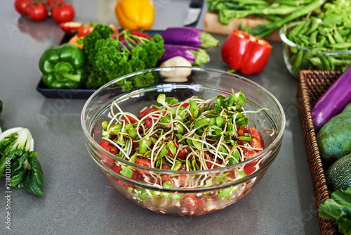 Fresh vegetable salad on table.