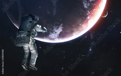 Fototapeta Naklejka Na Ścianę i Meble -  Deep space planets, awesome science fiction wallpaper, astronaut at spacewalk. Elements of this image furnished by NASA