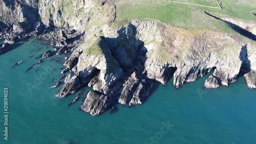 Aerial view of the beautiful cliffs close to the historic South Stack lighthouse on Anglesey - Wales photo