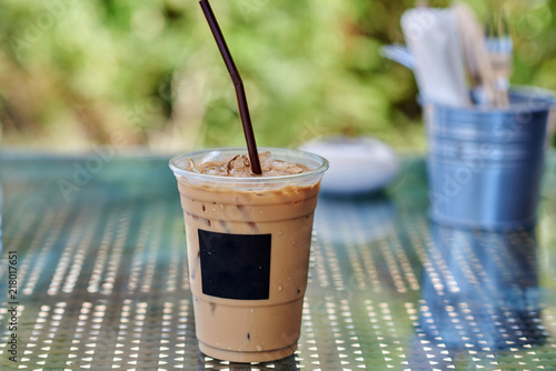Iced coffee or caffe latte in takeaway cup.