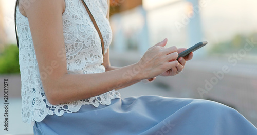 Close up of woman use smart phone at outdoor