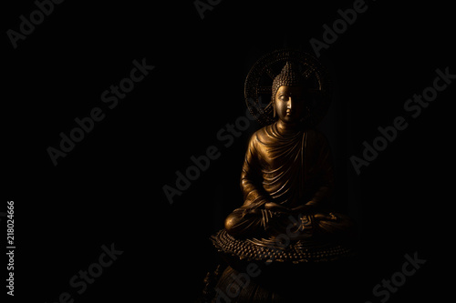 Buddha portrait isolated on black