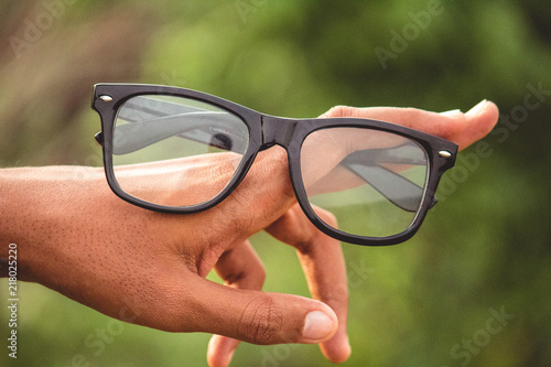 Man Holding Glasses