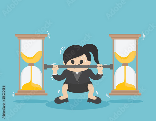 business woman lifts coin Very heavy ,Fight against time