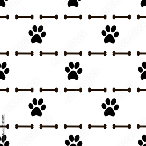 Seamless patterns with black animal footprints and bones.