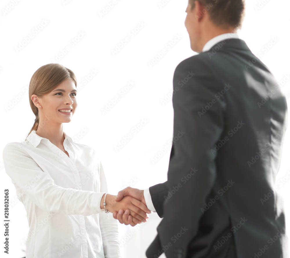 handshake young business woman with a colleague handshake young business woman with a colleague