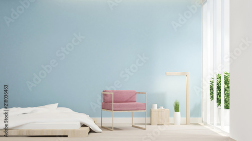 Bedroom and pink chair on living area design room for artwork. Bedroom and living area on light blue wall decorate and empty space for add message artwork. 3D Rendering.