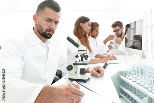 young scientist works in the lab.