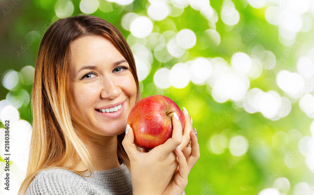 smiling woman with healthy teeth holding red apple smiling woman with healthy teeth holding red apple