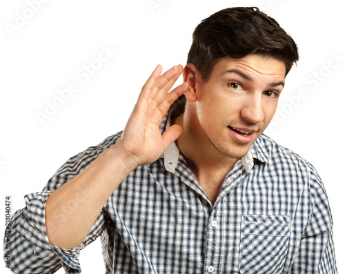 man having hearing problem listening to something