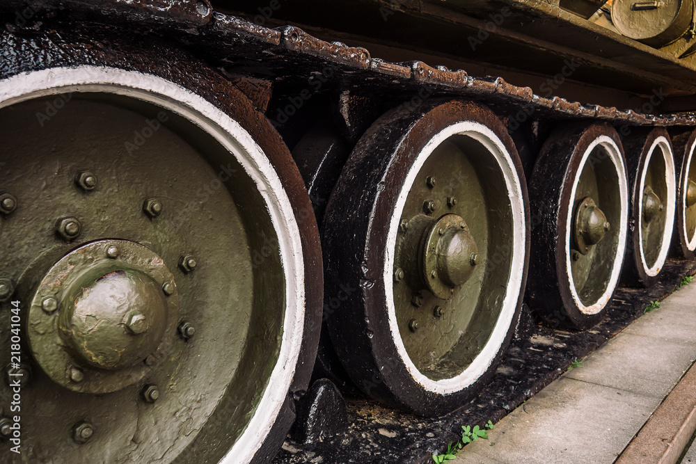 Caterpillars of the old Soviet military machine. In the park there are exhibits of military equipment.