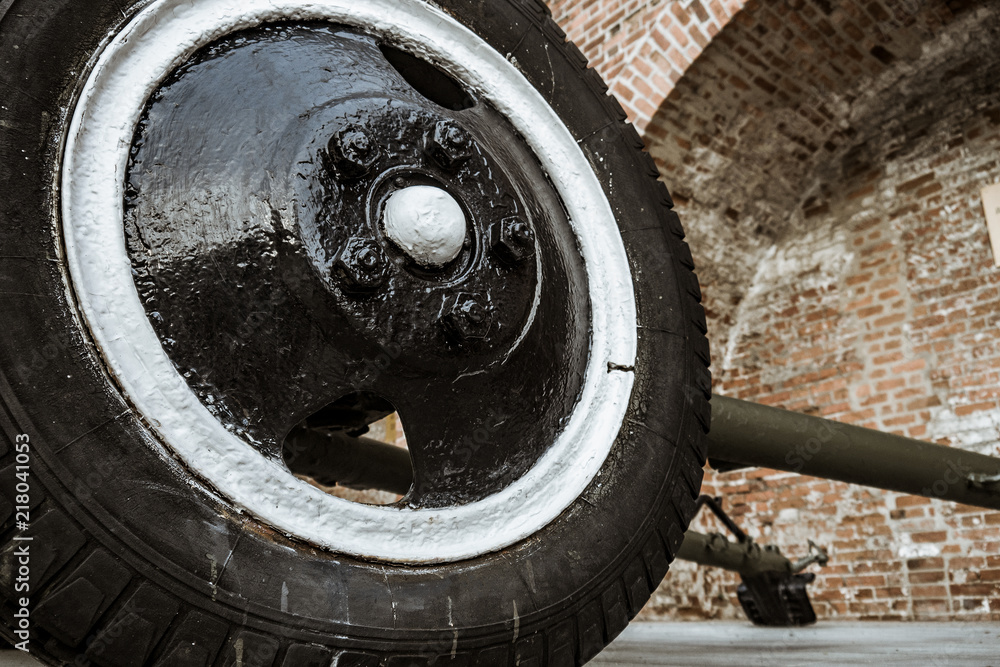 The wheel of the old Soviet military machine. In the park of the exhibits of military equipment
