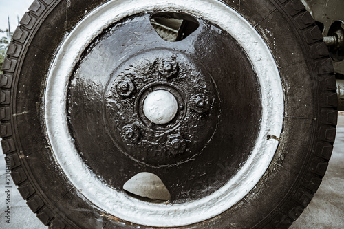 The wheel of the old Soviet military machine. In the park of the exhibits of military equipment