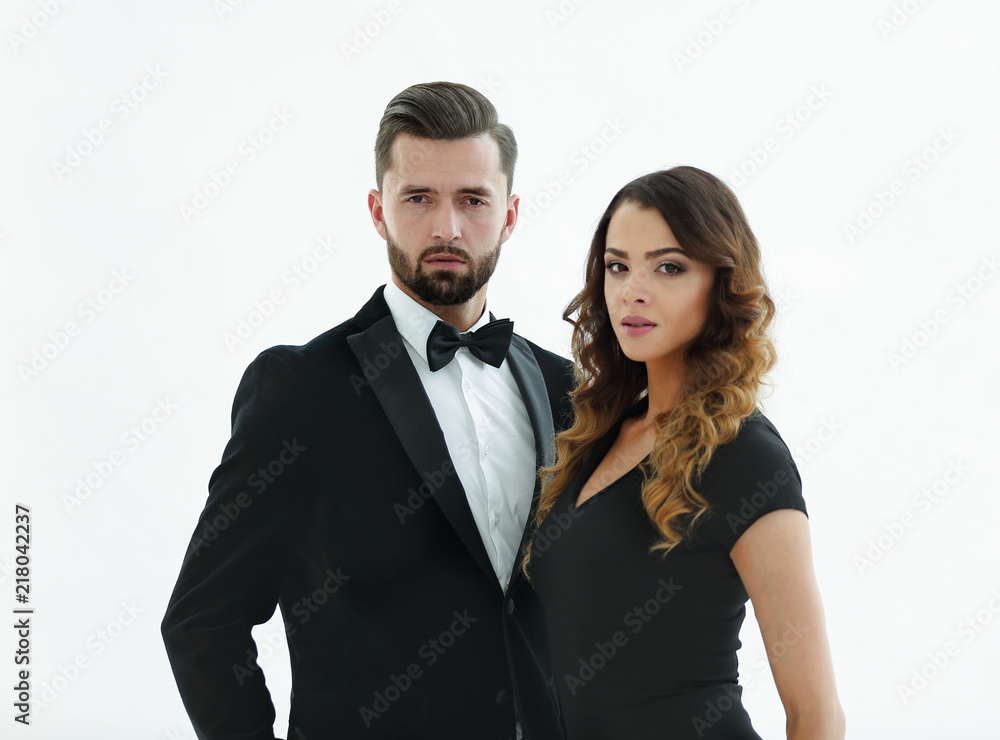 Portrait of a handsome man looking at the camera with a woman Portrait of a handsome man looking at the camera with a woman