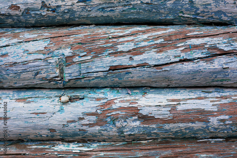 background of a textured old wall made of blue wooden beams background of a textured old wall made of blue wooden beams