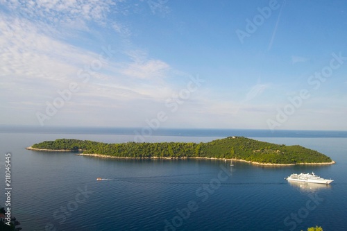 Lokrum the Cursed Island near Dubrovnik in Croatia with Luxury yacht in background